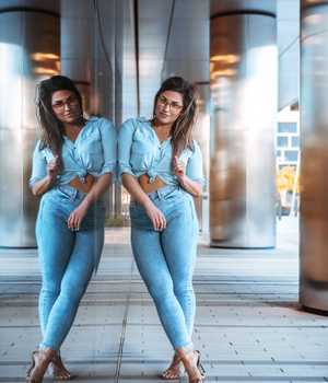 Model in lightblue slim-fit denim